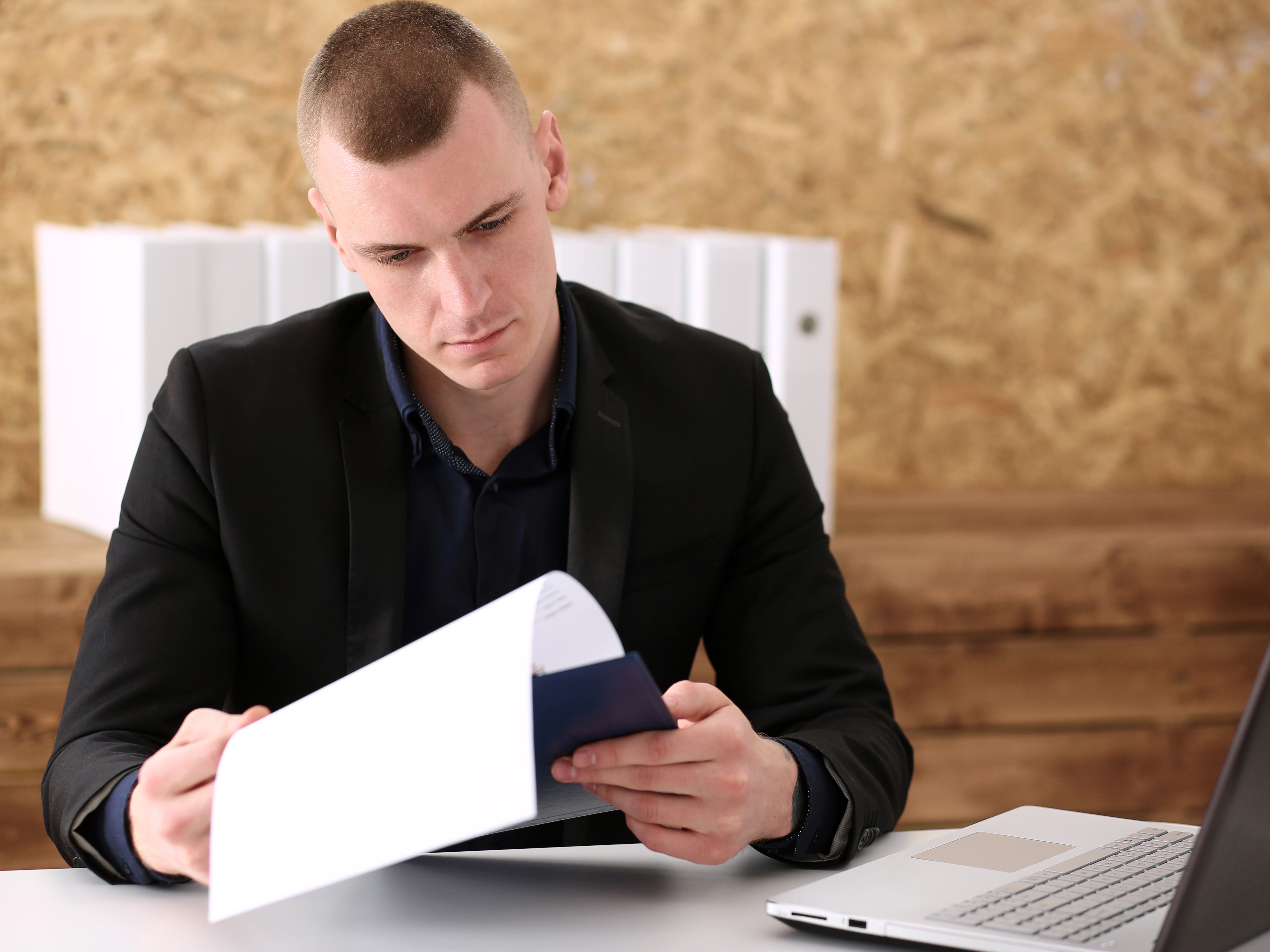 A person reading a document.